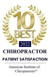 10 Best 2022 Chiropractor Award for Patient Satisfaction from the American Institute of Chiropractors, featuring a gold laurel design.