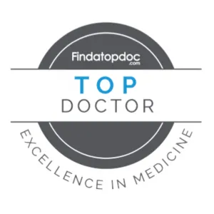 Top Doctor award logo from Findatopdoc.com, highlighting excellence in medicine, relevant to DRX Chicago's commitment to high-quality spinal decompression therapy.