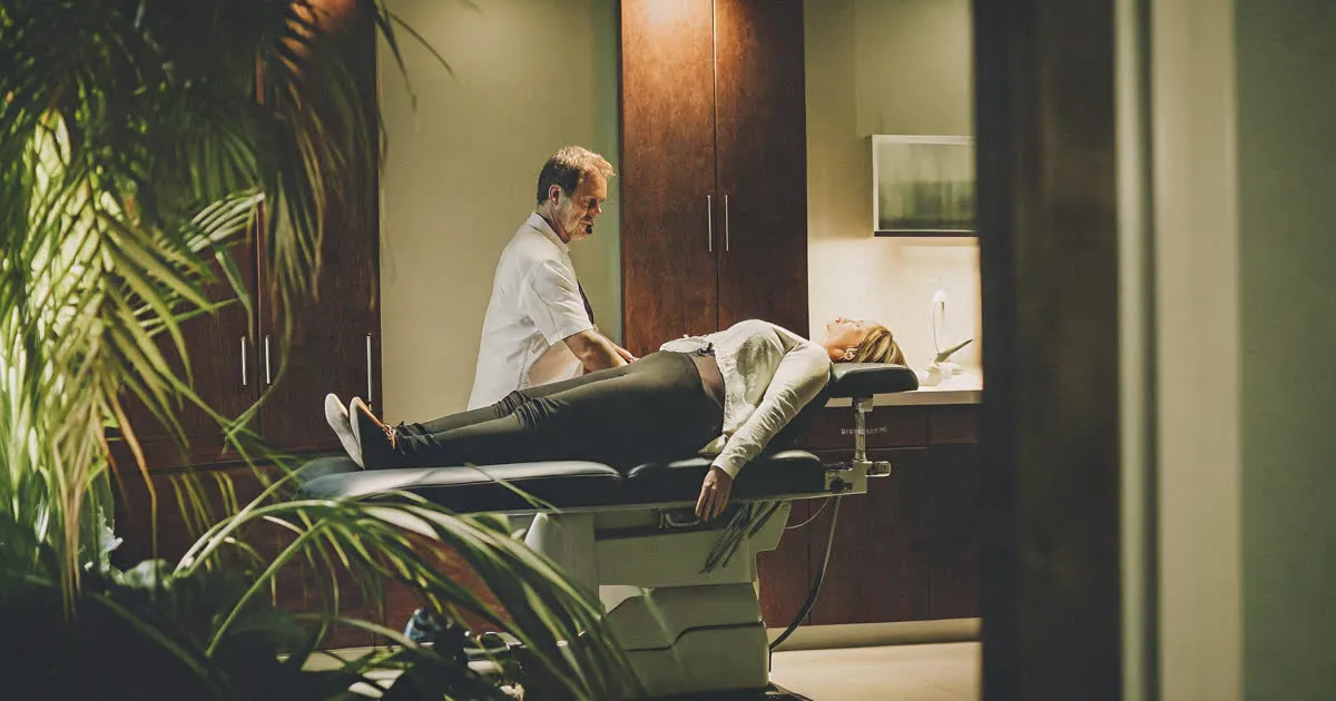 Professional chiropractic clinic with spinal decompression table and healthcare provider in Chicago